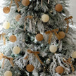 7ft Starlight Express pre-lit luxury snowy Lorax Christmas tree with frosted branches and integrated lights