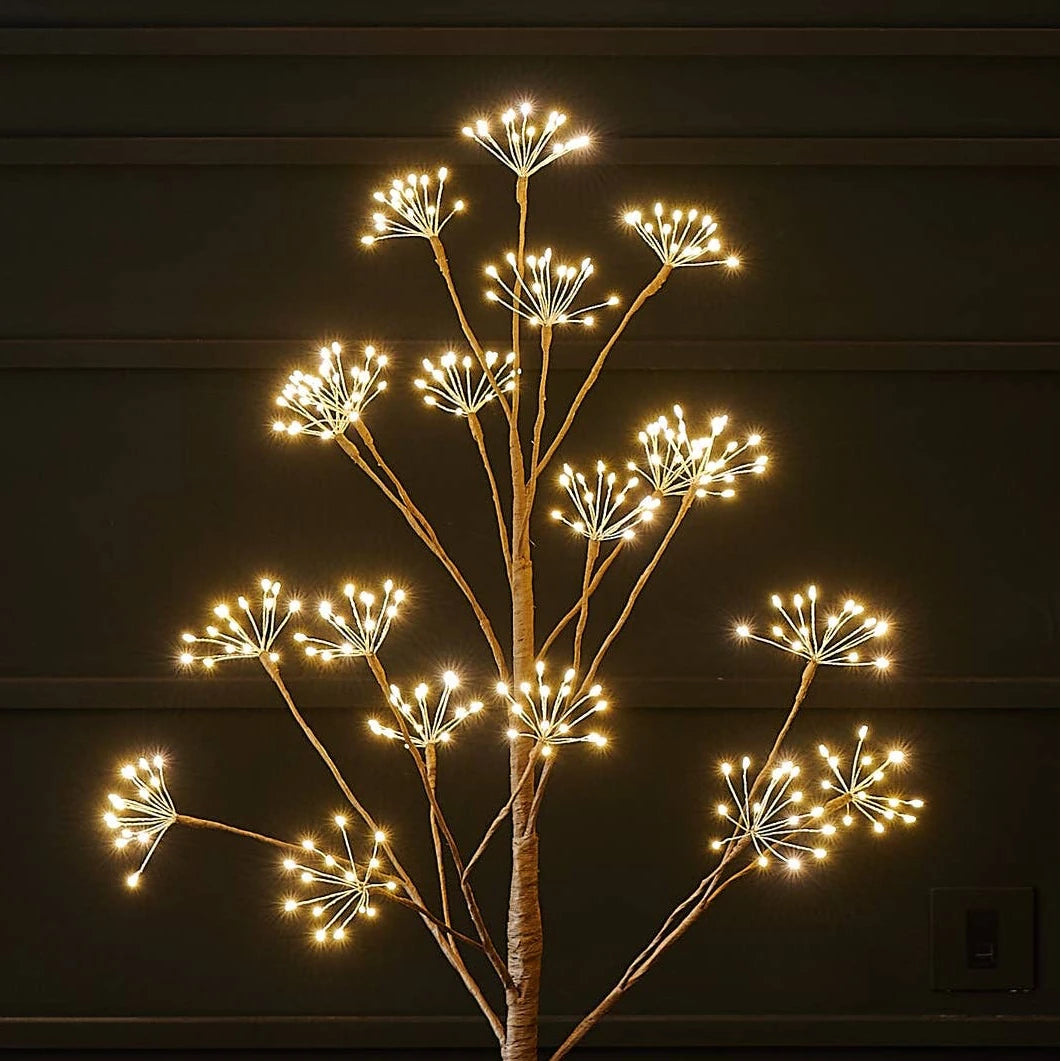 Lightstyle London LED Woodland Tree illuminated for Christmas, featuring a festive woodland design with bright lights.