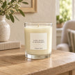 Heaven Scent Lime, Basil & Mandarin Medium Candle unlit on an oak console