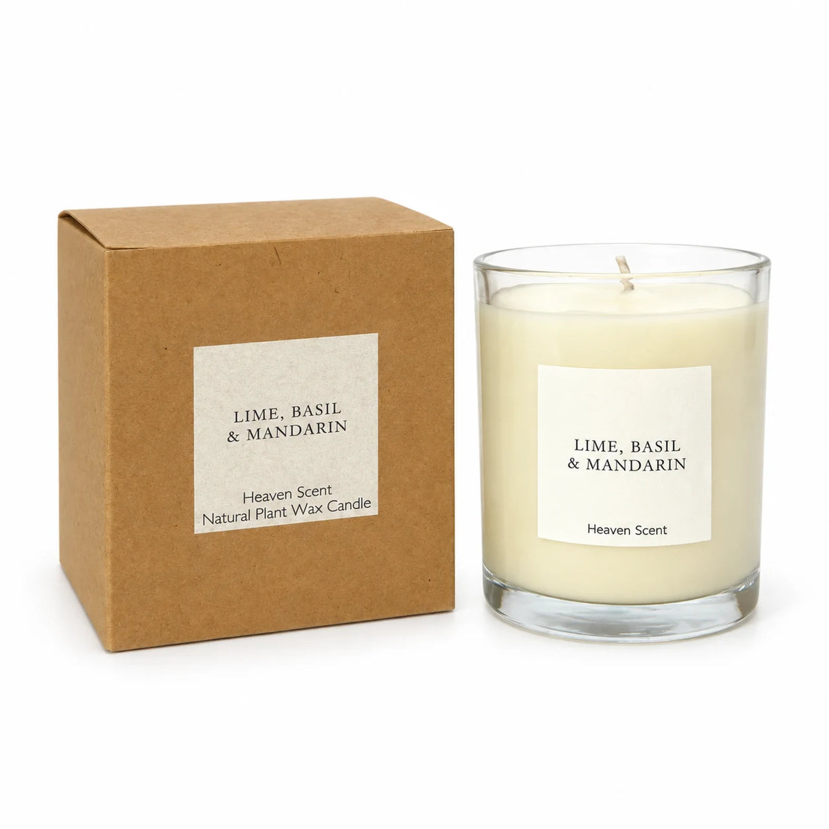 Heaven Scent Lime, Basil & Mandarin Medium Candle, unlit with its brown kraft box against white
