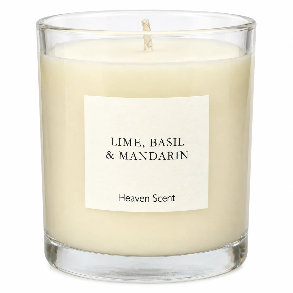 Heaven Scent Lime, Basil & Mandarin Medium Candle, close-up of the fragrance label and clear glass