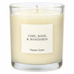 Heaven Scent Lime, Basil & Mandarin Medium Candle, close-up of the fragrance label and clear glass