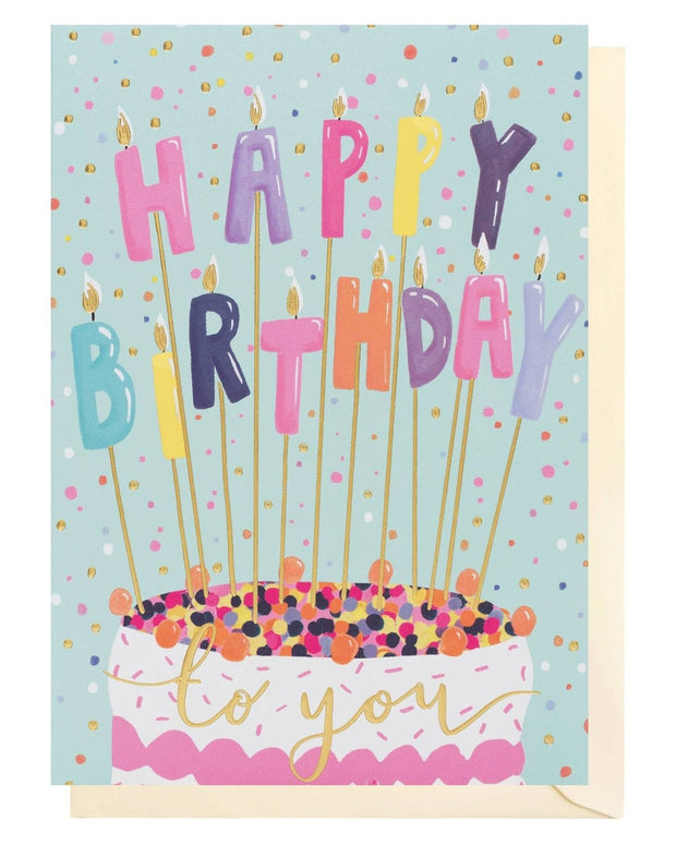 Louise Tiler birthday greeting card featuring colorful candles on a festive cake, perfect for celebrating with loved ones.