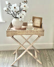 Lows rattan rectangle tripod side table with wooden legs, modern furniture piece for living room or bedroom decor.