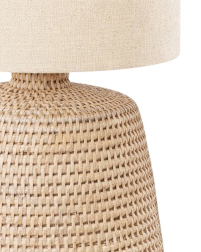 Lows rattan small table lamp with matching shade, perfect for home decor, featuring a natural woven rattan design and warm lighting.