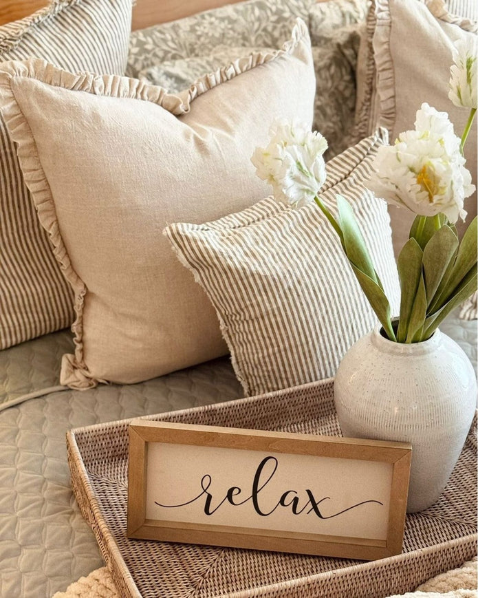 Lows rattan rectangle footed tray with handles for home decor, featuring a natural woven design and sturdy footed base.