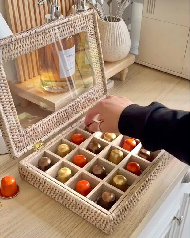 Lows rattan coffee pod and wax melt storage box for Nespresso capsules, ideal for kitchen and dining organization.