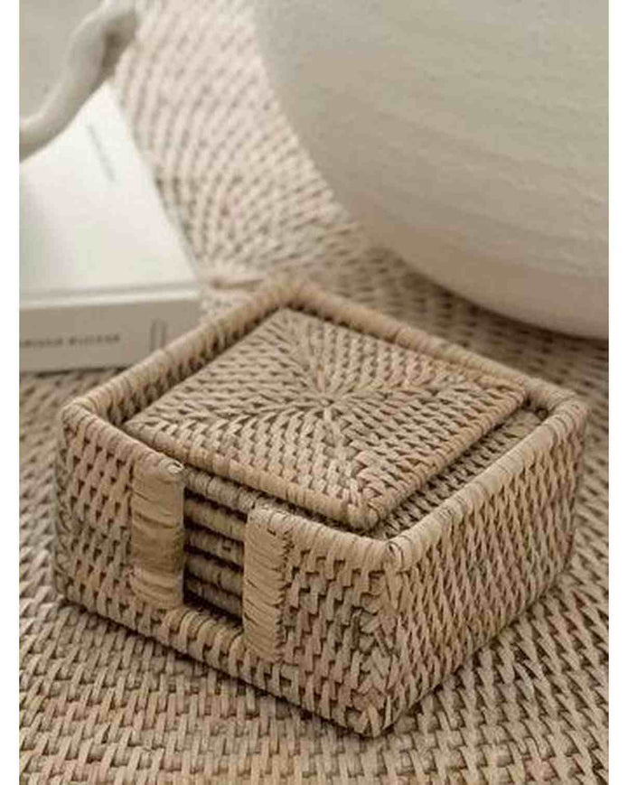 Lows rattan square coaster set with matching holder, ideal for protecting surfaces in kitchen and dining areas