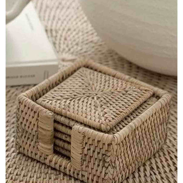 Lows rattan square coaster set with matching holder, ideal for protecting surfaces in kitchen and dining areas