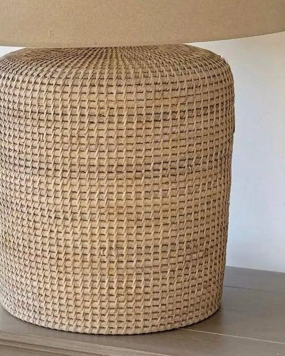 Large rattan table lamp from Lows lighting collection, featuring a woven rattan design and sturdy base for elegant home lighting.