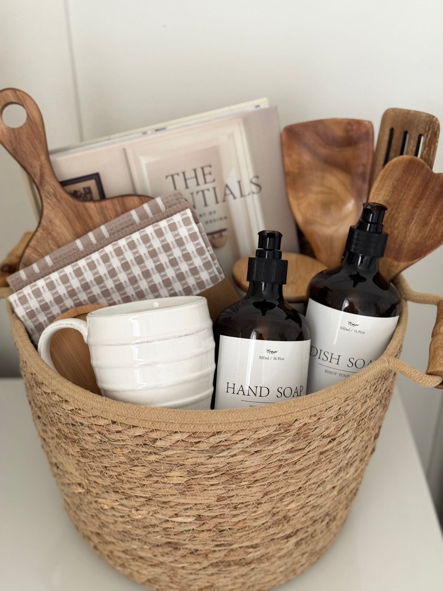 Spring themed New Home Gift Basket by Lulu Loves Home with decorative items and cozy essentials for celebrating a new home.