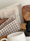 Spring-themed New Home Gift Basket by Lulu Loves Home with fresh decor and cozy essentials for a welcoming home.