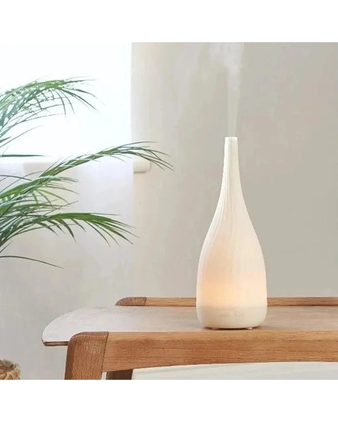 White Thalia Aroma Mist Diffuser by Made By Zen, a sleek home fragrance device for soothing aroma mist.