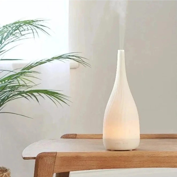 White Thalia Aroma Mist Diffuser by Made By Zen, a sleek home fragrance device for soothing aroma mist.