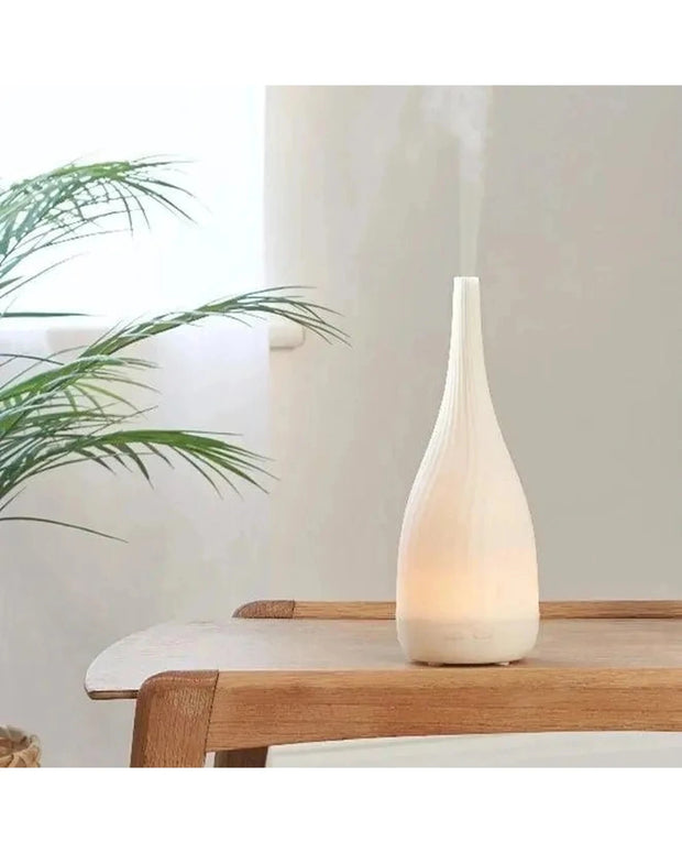 White Thalia Aroma Mist Diffuser by Made By Zen, a sleek home fragrance device for soothing aroma mist.