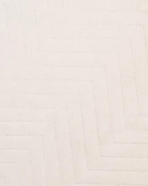 Malini Amelle Ivory Cream Queen Size Quilted Bedspread showcasing soft, plush quilting on a comfortable bed.