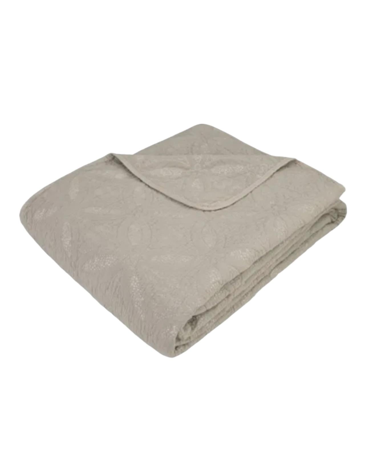 Beige king size quilted bedspread by Malini with soft, textured quilted design for cozy bedroom decor.