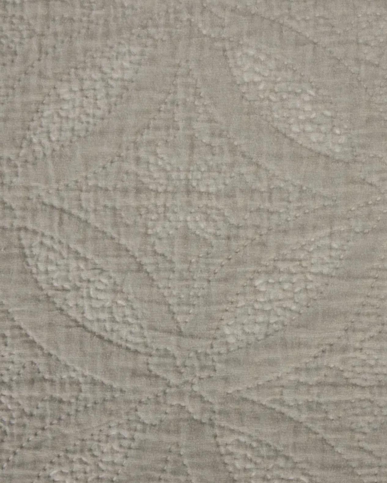 Malini Amity beige king size quilted bedspread with soft, plush fabric and intricate quilting design for a cozy bedroom look.