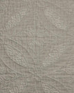Malini Amity beige king size quilted bedspread with soft, plush fabric and intricate quilting design for a cozy bedroom look.