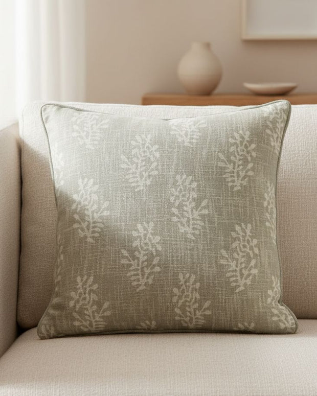 Beige block flower cushion cover from Malini's soft furnishings collection, featuring floral pattern and soft fabric.