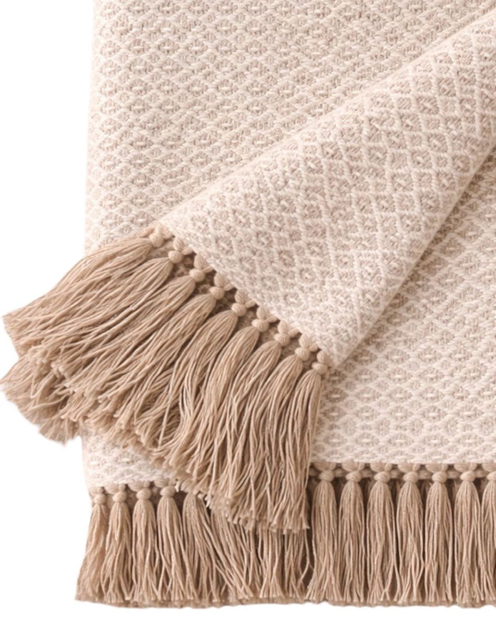 Beige Malini cotton throw with natural diamond weave, soft furnishings for cozy home decor.