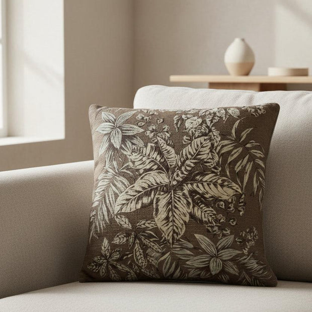Brown vintage floral printed cushion cover from Malini, soft furnishings with intricate floral design and cozy fabric.