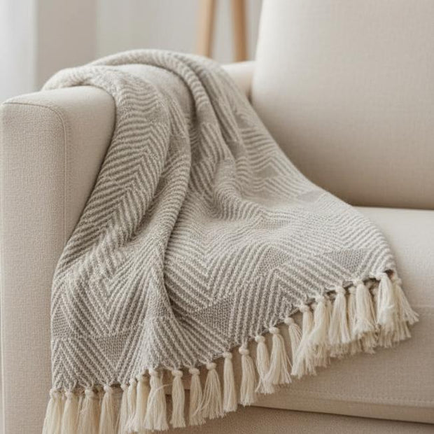 Malini Haven Triangle Beige natural blanket throw, soft furnishings with geometric pattern, cozy and stylish for home decor.