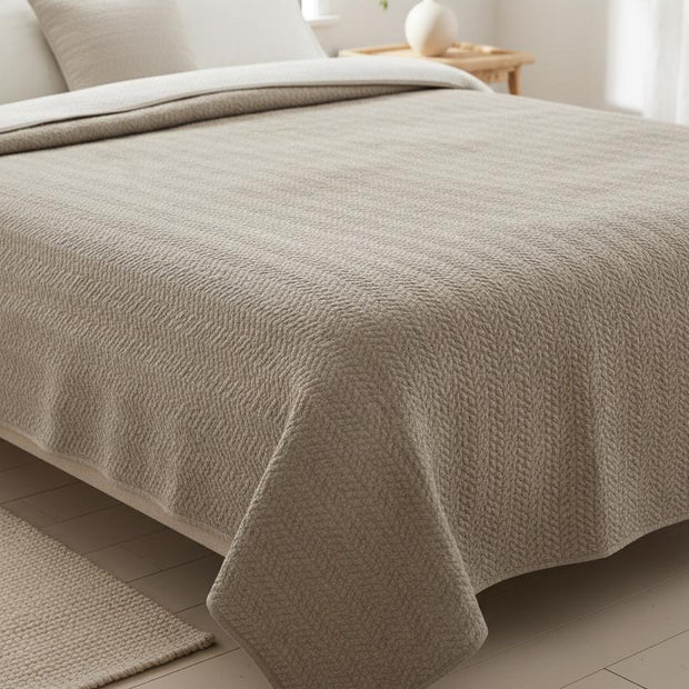 Malini Henderson taupe king size quilted bedspread with soft, textured quilting for a luxurious bedroom look.