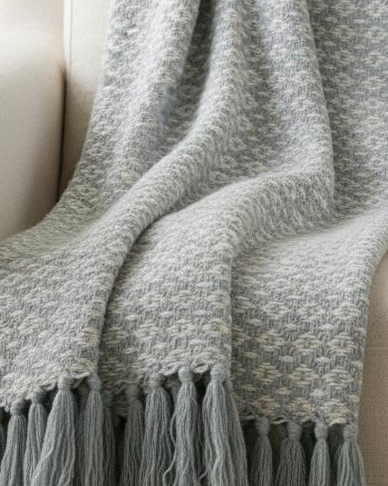 Ocean blue diamond weave cotton throw by Malini, soft furnishings with intricate pattern and cozy texture.