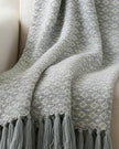 Ocean blue diamond weave cotton throw by Malini, soft furnishings with intricate pattern and cozy texture.