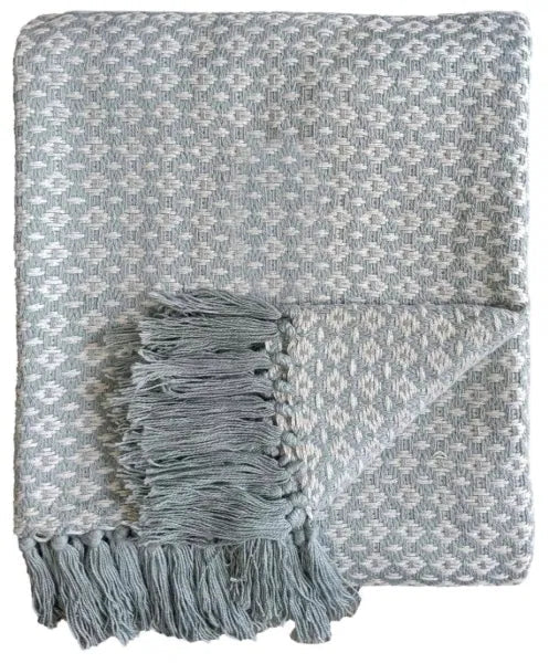 Ocean blue diamond weave cotton throw by Malini, showcasing soft furnishings with a textured, cozy design.