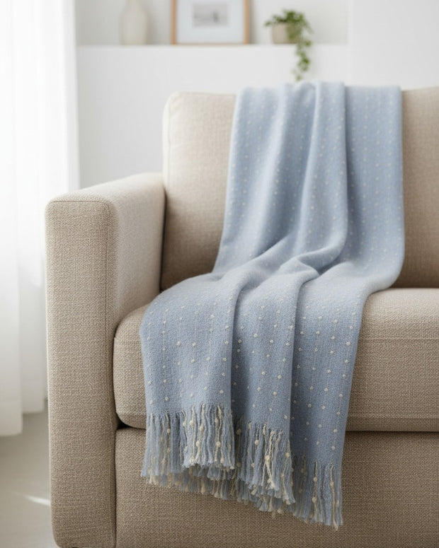 Ocean blue Malini Maisie dotted blanket throw, soft furnishings with a cozy, dotted pattern and lightweight fabric.