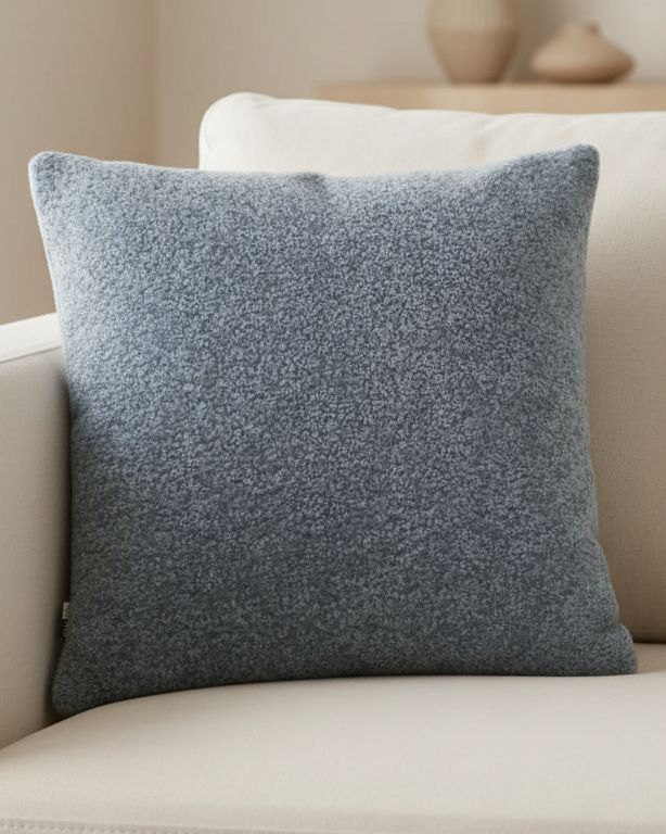 Ocean blue textured cushion cover from Malini, soft furnishings with a cozy, tactile fabric and stylish design.