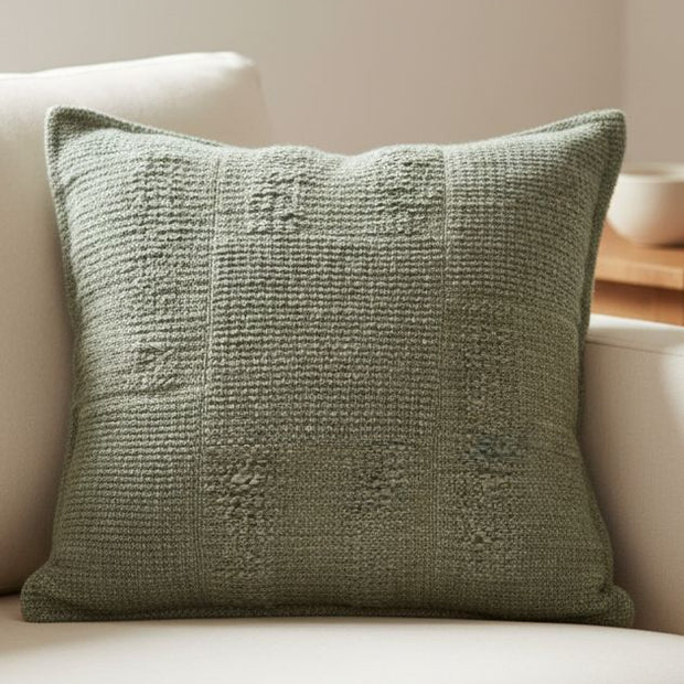 Olive green textured square cushion cover by Malini, soft furnishings with a stylish fabric design.