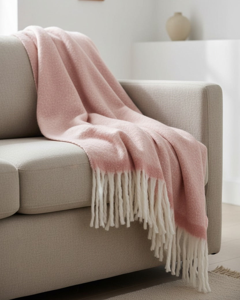 Pink Mia fleece blanket throw by Malini, cozy and soft soft furnishings for warmth and comfort.