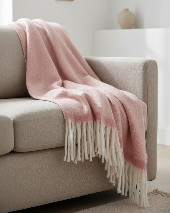 Pink Mia fleece blanket throw by Malini, cozy and soft soft furnishings for warmth and comfort.