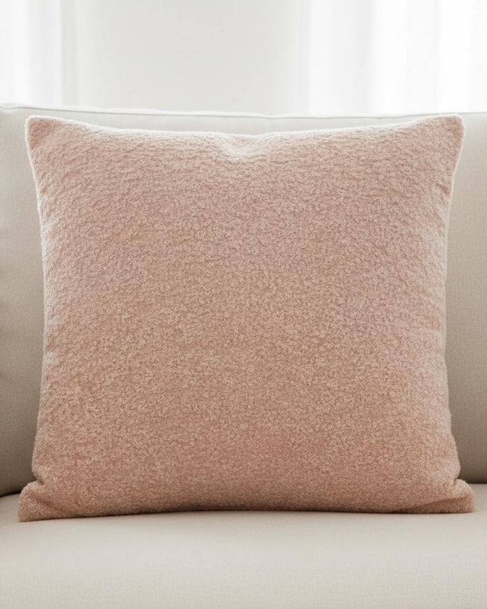 Pink textured cushion cover by Malini, soft furnishings, showcasing a cozy and stylish fabric design for home decor.