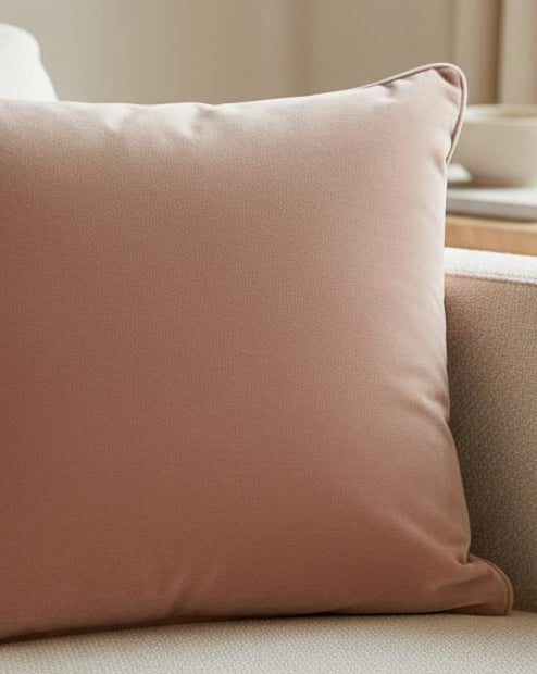 Rose pink velvet cushion cover with piped edges from Malini, soft furnishings accessory for cozy home decor.
