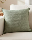 Sage green textured cushion cover by Malini, soft furnishings, showing close-up of fabric and stylish design