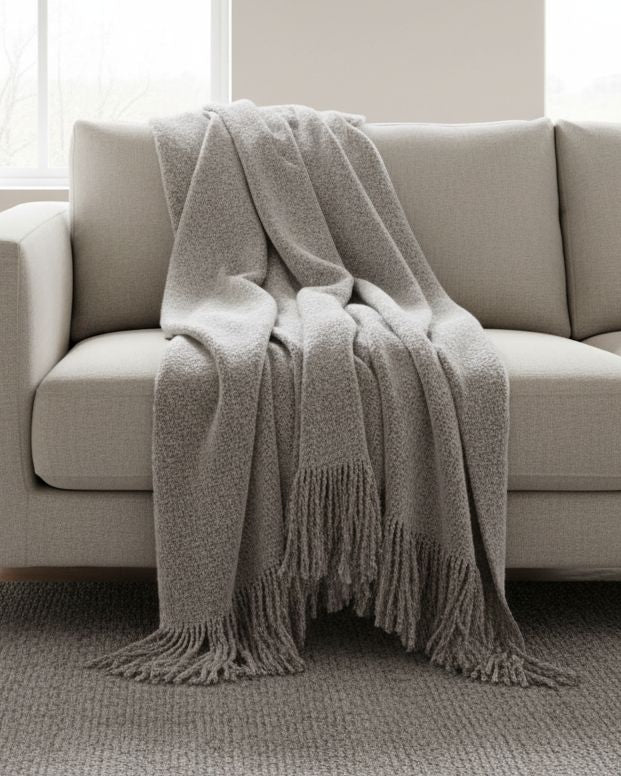 Malini Serena grey mohair-style blanket throw, soft furnishings with a cozy, textured appearance for home decor.