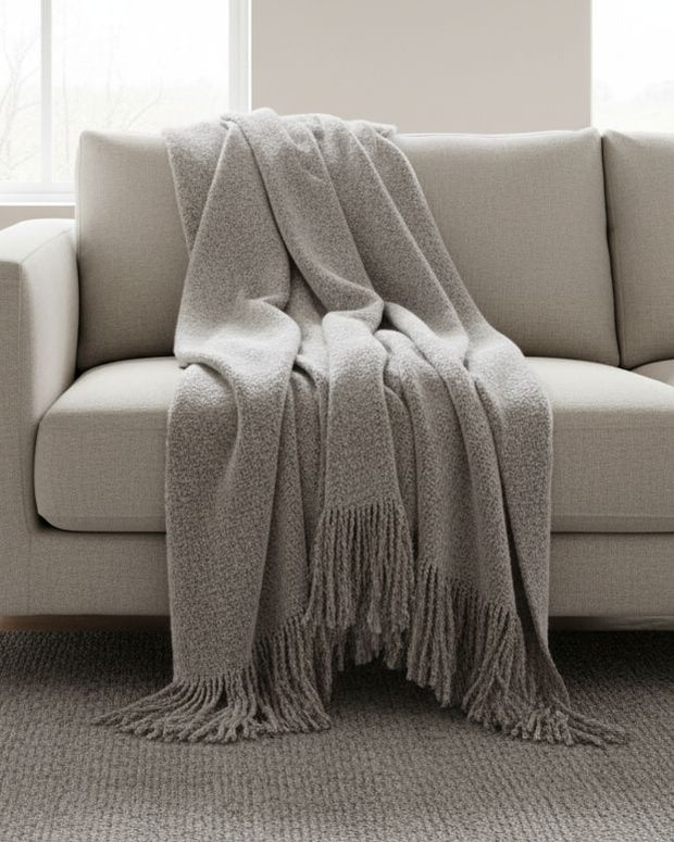 Malini Serena grey mohair-style blanket throw, soft furnishings with a cozy, textured appearance for home decor.