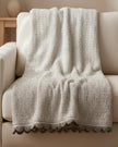 Malini Stello Tactile Beige Natural Blanket Throw, soft furnishings with cozy, textured fabric for comfortable home decor.