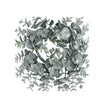 Frosted eucalyptus candle wreath with rounded grey-green leaves and a crystalline finish on white.