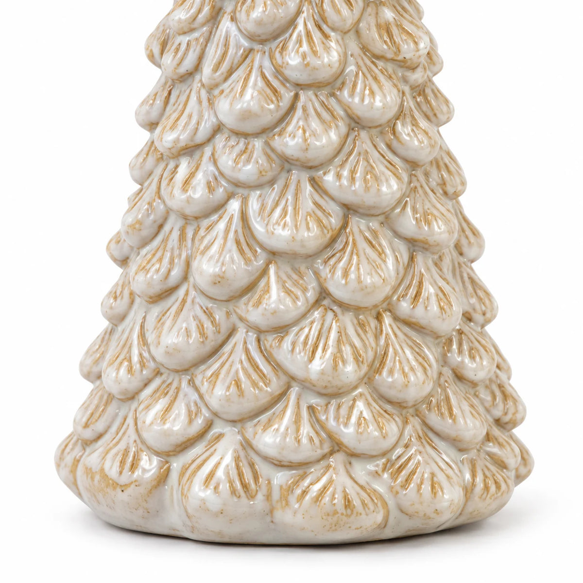 Close-up of the cream glaze and sculpted layered branch detail on the ceramic Christmas tree