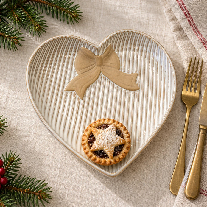 Satchville medium heart plate with bow detail for Christmas table settings