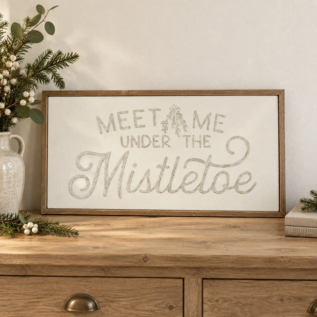 Wood & Metal Sign - White And Gold Meet Me Under The Mistletoe on an oak console.