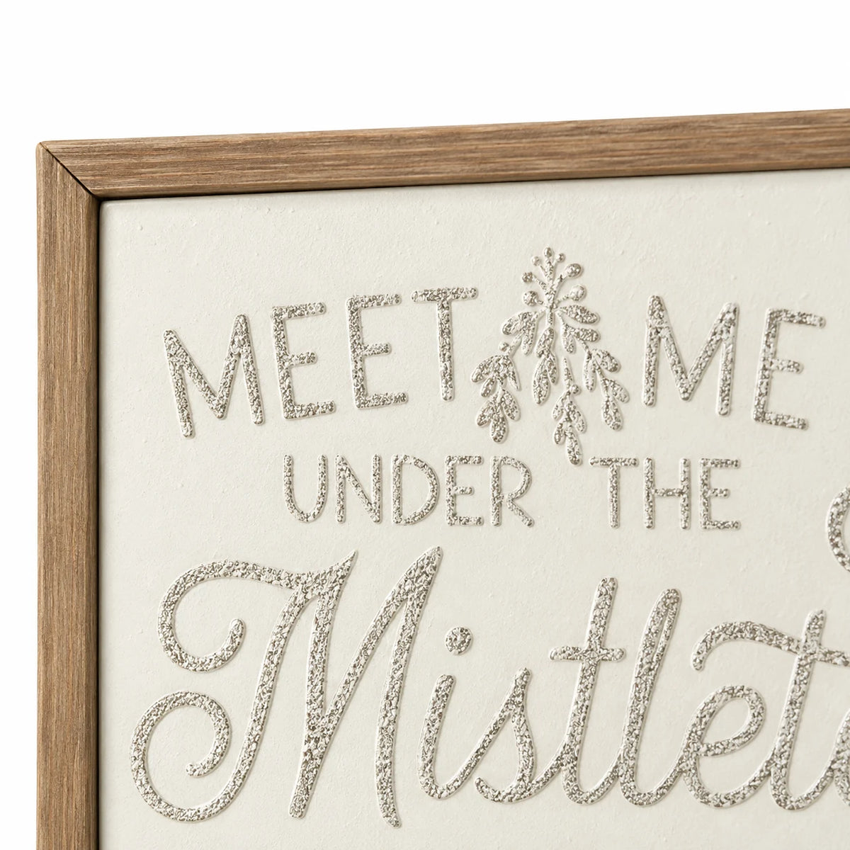 Close-up of natural wood frame corner and original mistletoe motif on Wood & Metal Sign - White And Gold Meet Me Under The Mistletoe.