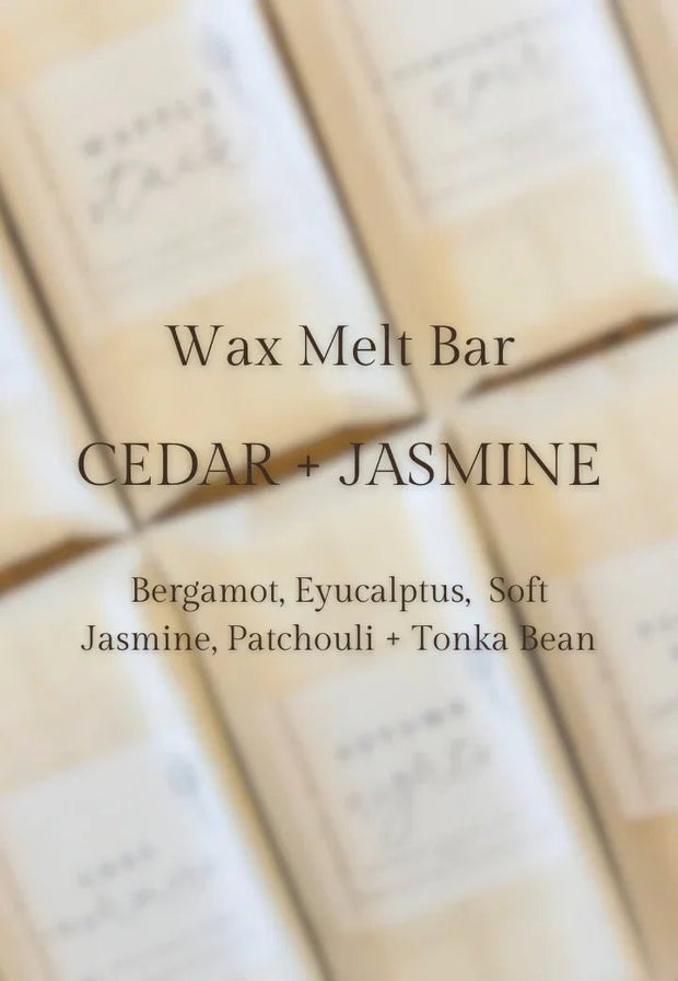 Meleri and Maple Co scented wax melt snap bar with cedar and jasmine fragrance, showing the wax melt piece in a natural setting.