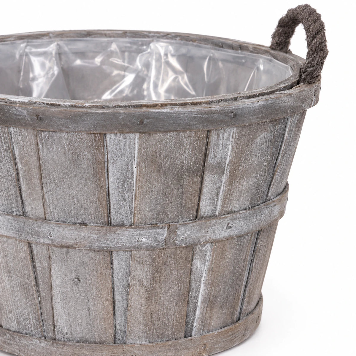 Studio close-up of small Meon basket greywashed stave finish, bands and rope handle