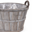 Studio close-up of small Meon basket greywashed stave finish, bands and rope handle